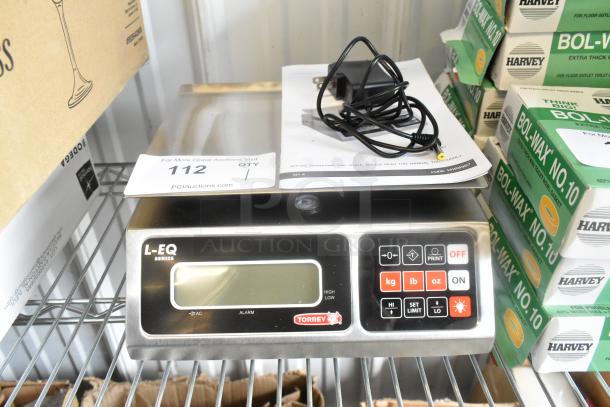 Brand new Torrey L-EQ 10/20 digital portion control scale, 20 lb. capacity, legal for trade, with minor scratches, includes power adapter.