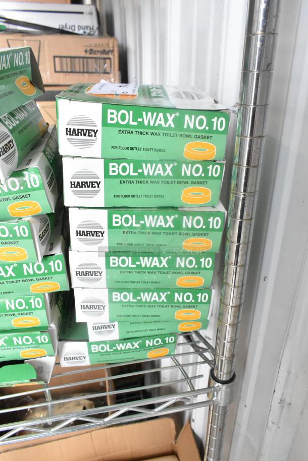 Seven new Harvey Oatey Bol-Wax No. 10 extra thick wax gaskets on a shelf, sized 3"/4", minor scratches and dents.