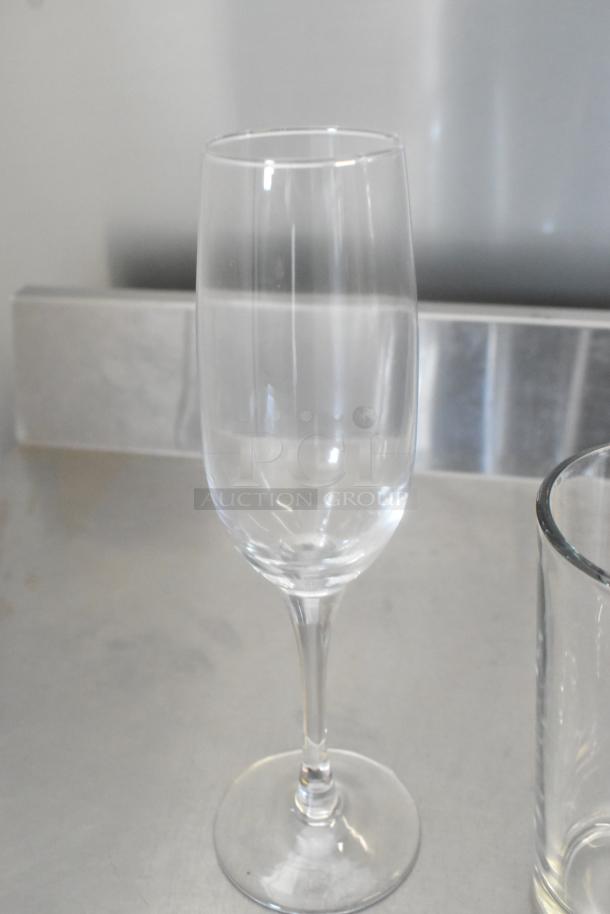 Brand new Acopa 8 oz. customizable flute glass, clear glass stemware. Perfect condition, ideal for special occasions.