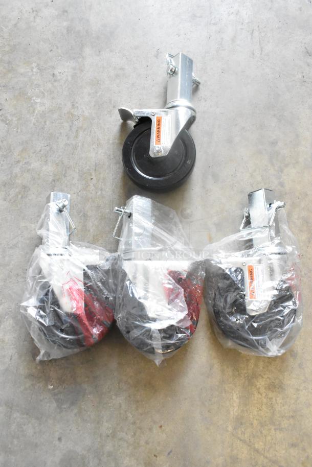 Lot of 4 brand new commercial casters, partially wrapped, with minor scratches. Featuring durable black wheels and metal mounts.
