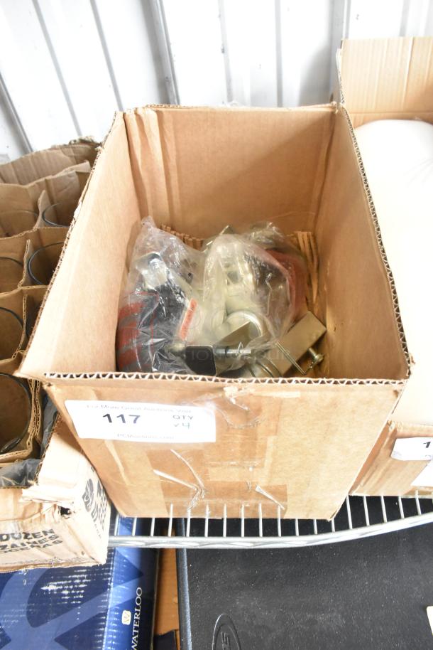 Lot of 4 brand new commercial casters in a box, some with minor scratches. Packaged in plastic. Box labeled "117 QTY x4."