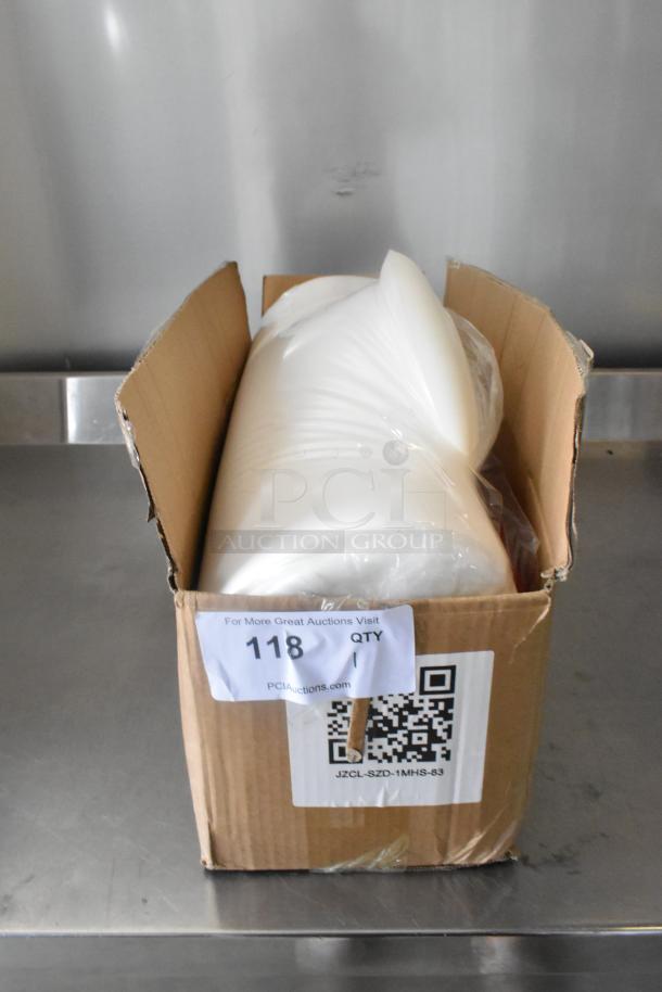Cardboard box with wrapped item inside, labeled "118 QTY, PCIAuctions.com." Box shows signs of wear.