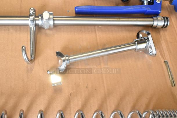 BRAND NEW 750PRAXF Waterloo 1.15 GPM pre-rinse assembly with riser, hose, spray valve; stainless steel, minor cosmetic dent.