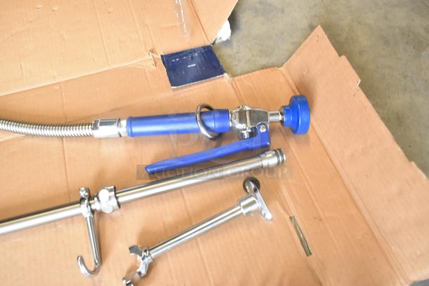 BRAND NEW SCRATCH AND DENT! 750PRAXF Waterloo 1.15 GPM pre-rinse assembly with riser, hose, and spray valve, minor cosmetic damage.