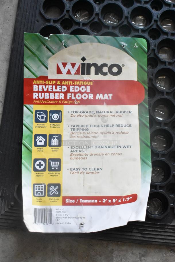Brand new Winco RBM-35K black anti-fatigue floor mat, 3'x5'x1/2', beveled edges, natural rubber, scratch and dent condition.