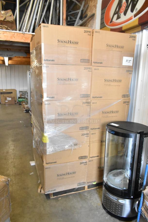 30 boxes of 100 StrongHolder Molded Fiber 2 Cup Carriers with Food Tray, brand new, in warehouse with visible Huhtamaki logo.