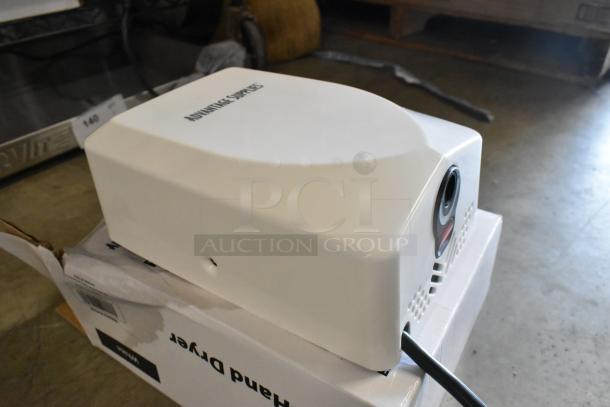 Advantage Supplies white ABS automatic hand dryer, model 158ADVHDW, new with slight packaging damage.