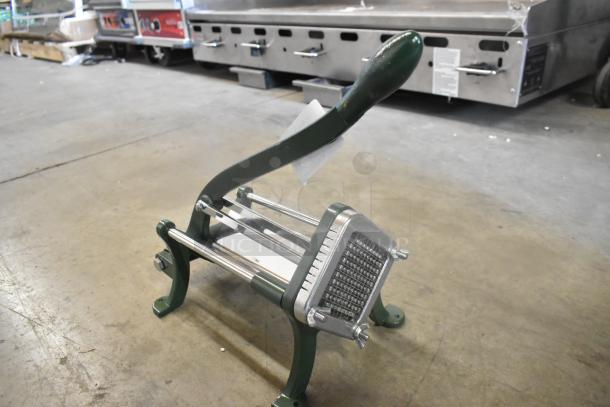 Brand new Garde metal vegetable cutter, scratch and dent, sturdy green frame, stainless steel blades, ideal for kitchens.