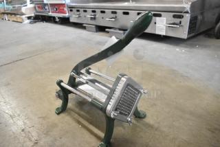 Brand new Garde metal vegetable cutter, scratch and dent, sturdy green frame, stainless steel blades, ideal for kitchens.