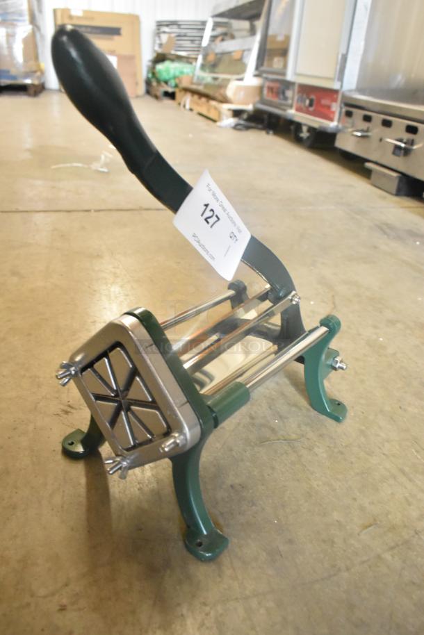 Brand new Garde Metal Vegetable Cutter, green and silver, marked "scratch and dent," features durable metal construction.