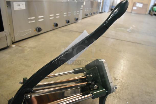 Brand new, scratch and dent Garde metal vegetable cutter with green handle, stainless steel rods, and visible tag.