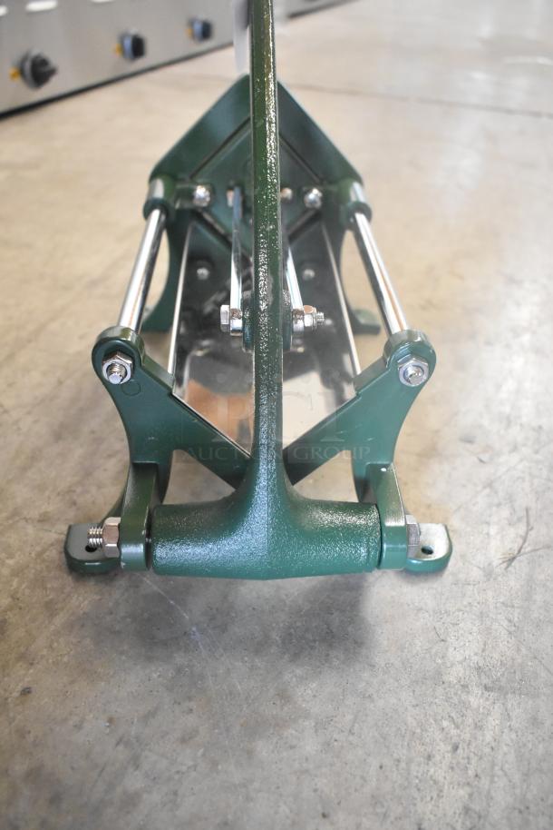 BRAND NEW SCRATCH AND DENT! Garde Metal Vegetable Cutter, durable green metal frame, industrial quality, bolts visible.