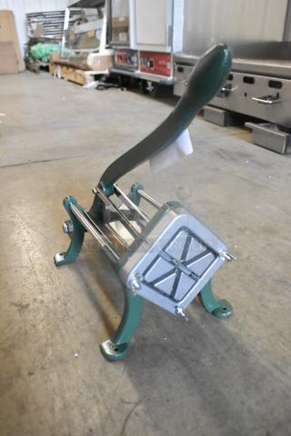 Brand new Garde metal vegetable cutter; scratch and dent. Features sturdy green frame, sharp blades, excellent condition.