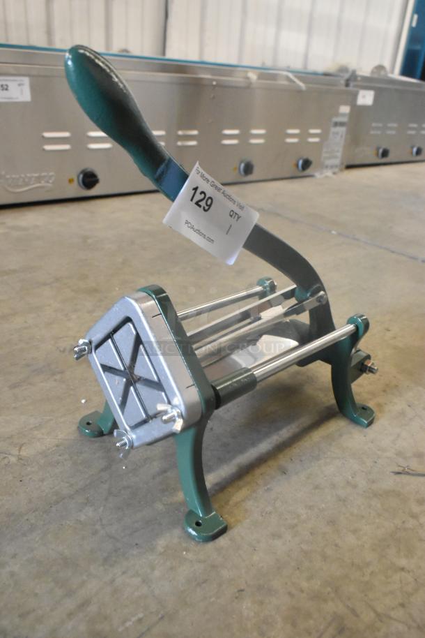 BRAND NEW Garde Metal Vegetable Cutter, scratch and dent condition, green handle, auction tag visible.
