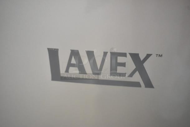 Brand new Lavex silver ABS plastic automatic hand dryer with HEPA filtration, 110/120 volts, visible logo.