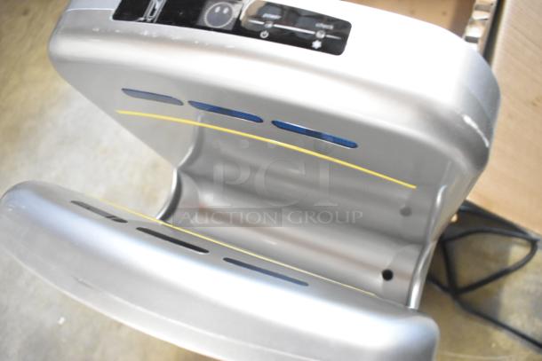 Brand new Lavex Silver ABS plastic automatic vertical hand dryer with HEPA filtration, scratch and dent condition, 110/120V.