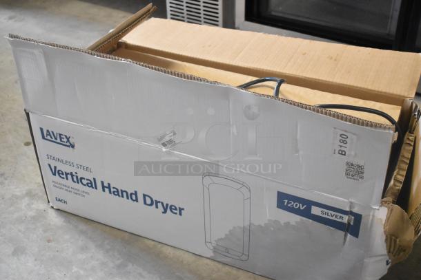 Lavex silver ABS plastic automatic vertical hand dryer, new with scratches and dents, HEPA filtration, 110/120V, in box.