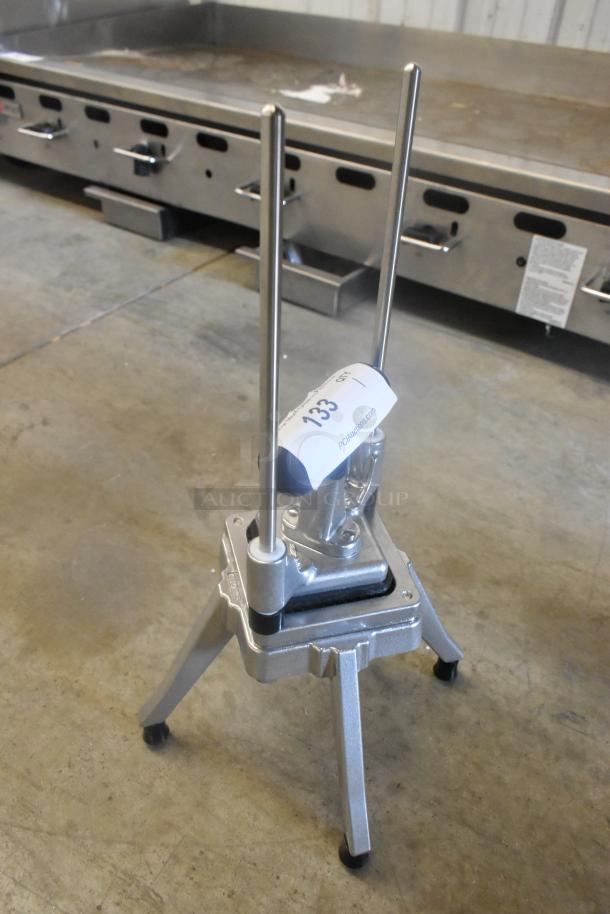 Brand new Choice 40725D 1/4" vegetable dicer, metallic finish, two-handles, scratch and dent condition, item label visible.