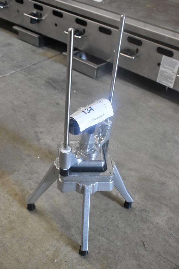 Brand new Choice 407375D vegetable dicer, 3/8" cut, scratch and dent condition, sturdy metal frame, auction tag visible.