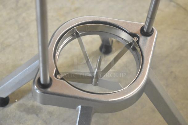 Brand new Choice 4074WDG Fruit/Vegetable Wedge Cutter, 4 sections, visible metal blades, minor scratches, durable design.