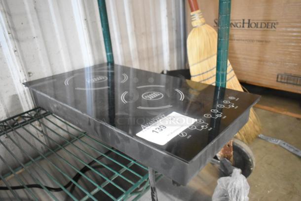 BRAND NEW Avantco 177ID18DB double induction range with minor scratches, features dual burners, 208-240V, 1 phase.