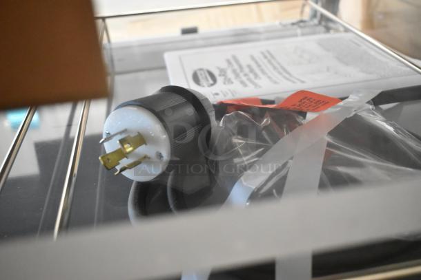 Stainless steel Hatco GRHD-4PD dual shelf merchandiser plug and manual, 120/208V, 1 Phase, new with minor scratches.