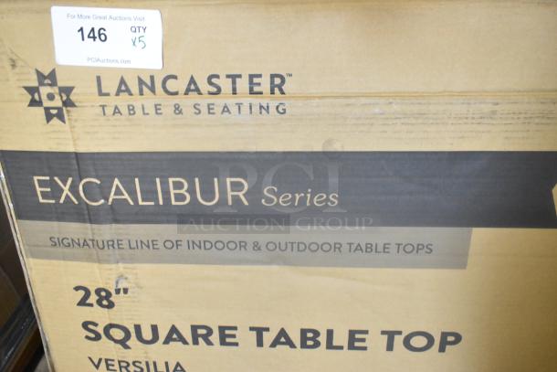5 new Lancaster Excalibur 28" x 28" square table tops with smooth Versilla finish, slight scratches, auction label visible.