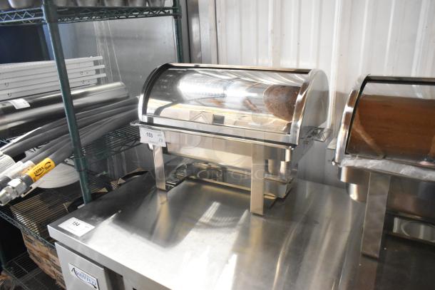 Stainless steel chafer, brand new, scratch and dent, includes lid, on metal shelf; tag reads "153 QTY 3".