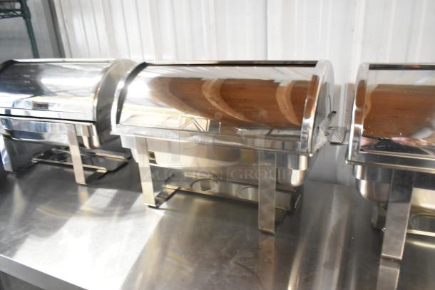 Brand new stainless steel chafer with minor scratches. Sturdy construction, ideal for catering. Auction item.