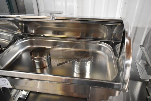 Three brand new stainless steel chafers, slightly scratched, includes lid and serving utensils, marked "QTY x3".