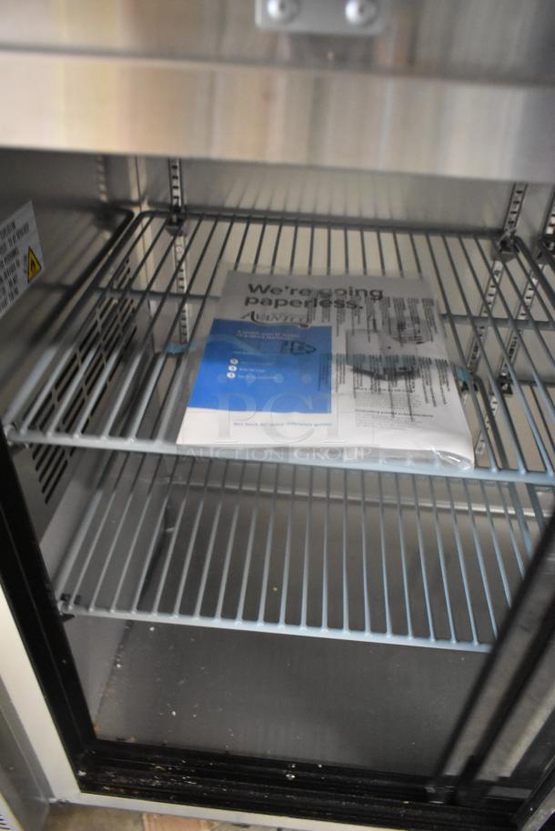 2024 Avantco 178UBB72SHCS stainless steel back bar fridge with sliding glass doors, 73" wide, LED lighting, unused condition.