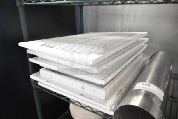 Stack of six brand new white vent covers, minor scratches. Ideal for ventilation upgrades.