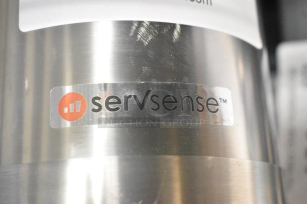 Brand new ServSense stainless steel cup dispenser, visible scratch, logo displayed prominently.