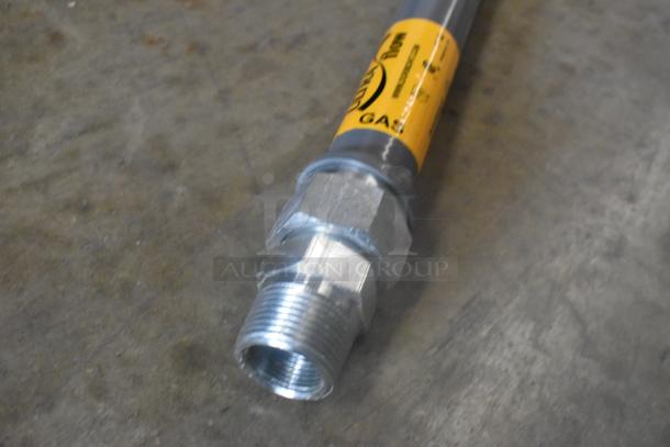 Brand new Dormont Ultra Flow gas hose with minor scratches and dents, showing metal connector and yellow label with branding.