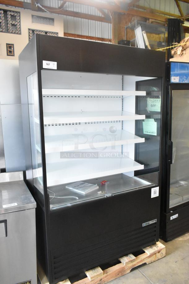 Brand new True TOAM-48GS-HC refrigerated air curtain merchandiser, 48", glass sides, 208-230V, 1 phase, minor scratches.