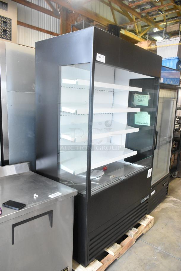 Brand new True TOAM-48GS-HC air curtain merchandiser, 48", glass sides, 208-230V, 1 phase, scratch and dent condition.