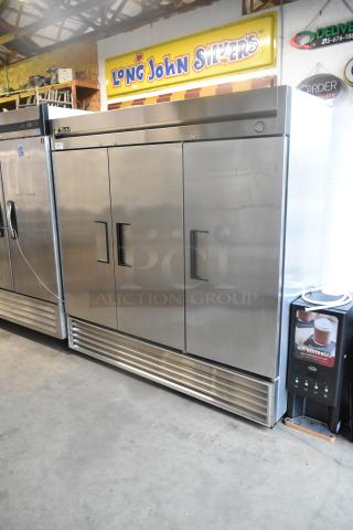 True T-72 stainless steel commercial 3-door reach-in cooler, 115 volts, 1 phase, in well-maintained condition.