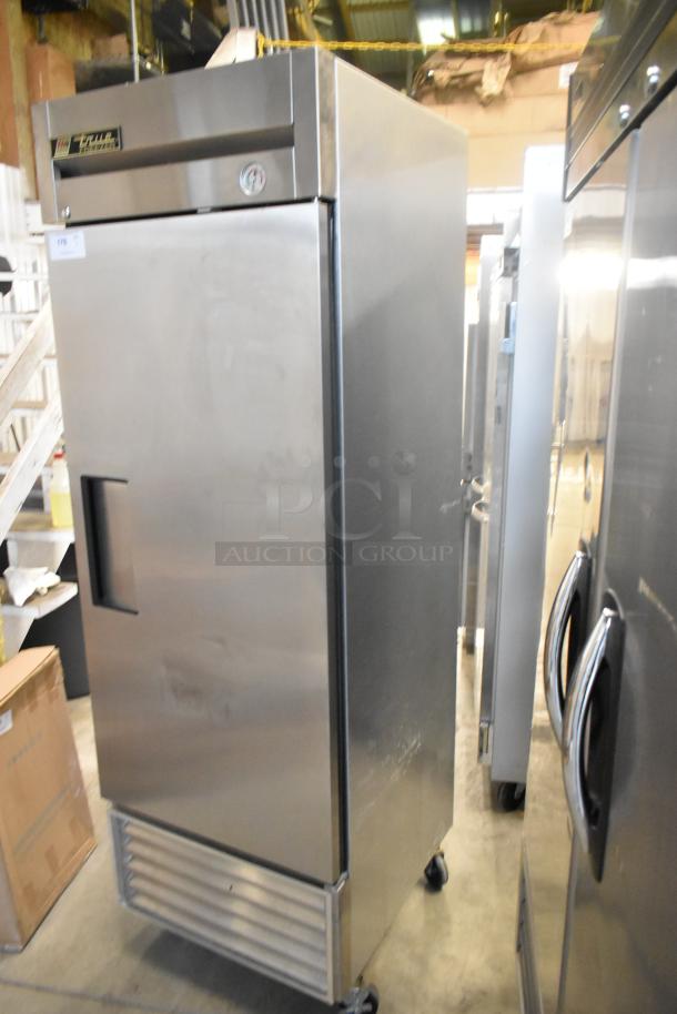 True T-23F stainless steel single-door freezer on commercial casters. 115V, 1 phase. Good condition, True logo visible.
