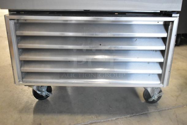 True T-23F stainless steel commercial freezer with single door, on casters. 115V, 1 phase. Vent and caster detail shown.