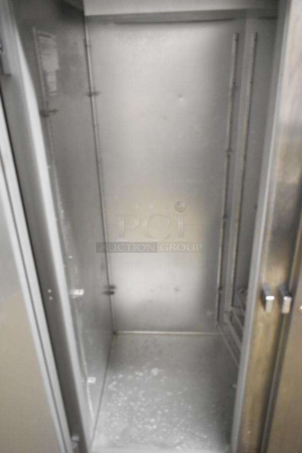 Beverage Air HF2-1S stainless steel commercial 2 door reach-in freezer, interior view. 115V, 1 Phase, on casters, well-maintained.