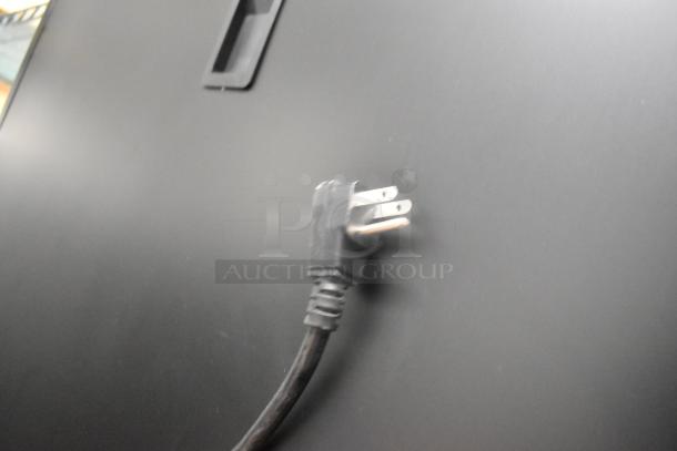 Beverage Air HF2-1S stainless steel commercial freezer plug detail, showing a standard 115-volt, 1-phase plug.