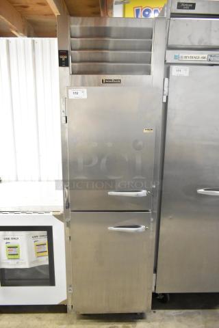 Traulsen ALT132DUT-HHS commercial reach-in freezer, stainless steel, 2 half-size doors, on commercial casters, 115V, 1 phase.