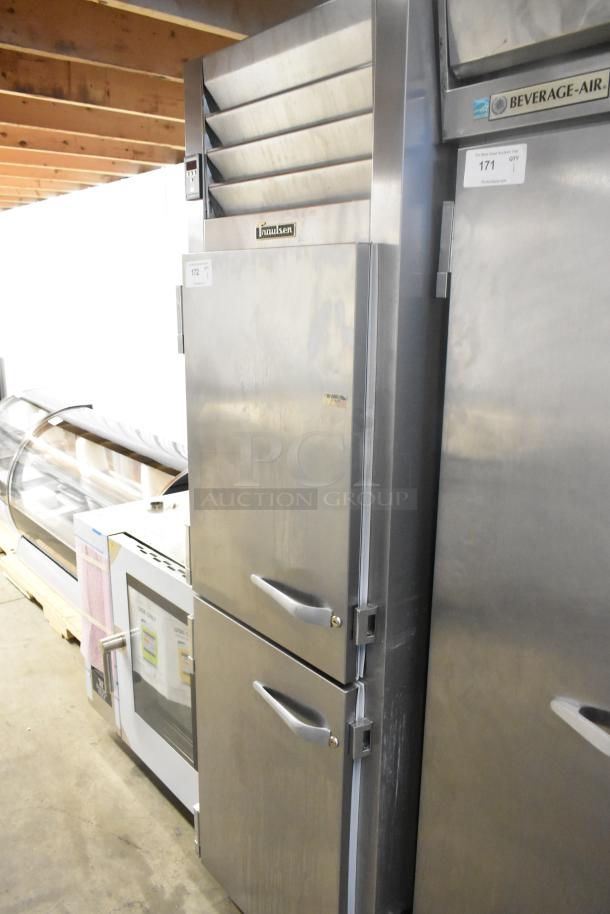 Traulsen ALT132DUT-HHS stainless steel commercial freezer with two half-size doors on casters, 115V, 1-phase.