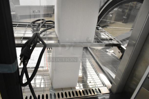 BRAND NEW Vollrath HDE8136 36" countertop curved glass heated display cabinet, 120V, 1 phase, foam and cables shown.