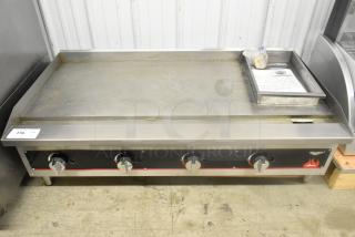 Vollrath Cayenne FTG-9048 Stainless Steel Flat Top Griddle, 112,000 BTU, natural gas, 4 control knobs, commercial use.