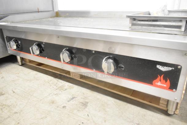 Vollrath Cayenne FTG-9048 griddle, stainless steel, 112,000 BTU, natural gas, four control knobs, good condition.