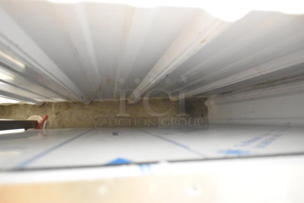 Stainless steel interior of Blodgett AETG101R combi convection oven, showing new condition with minor scratches.