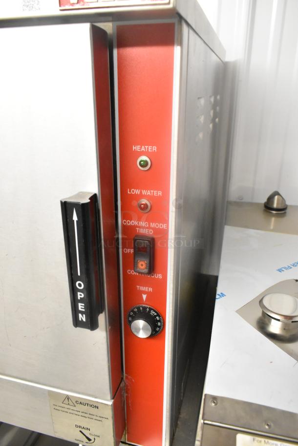 Vulcan VPX5 stainless steel single deck steam cabinet on stand. Features: heater, low water indicator, cooking mode options. 208V, 3 phase.