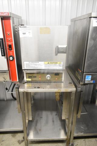 Southbend RS-4E RapidSteam SteamMaster stainless steel single deck steam cabinet on equipment stand, shows usage marks.