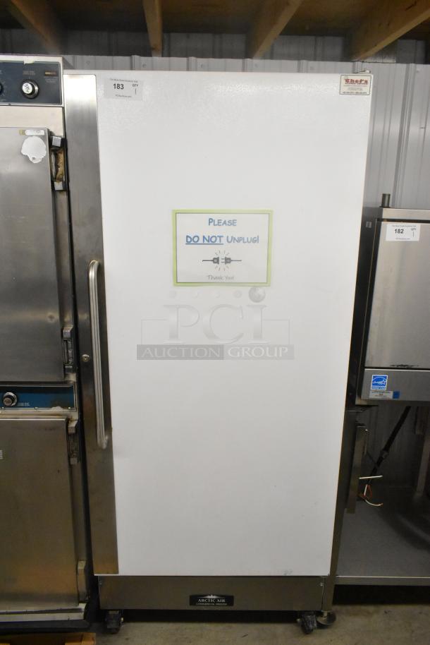 Arctic Air F22CWF3 Single Door Freezer on commercial casters. Model F22CWF3, 115V, 1 Phase. "Do Not Unplug" sign on door.